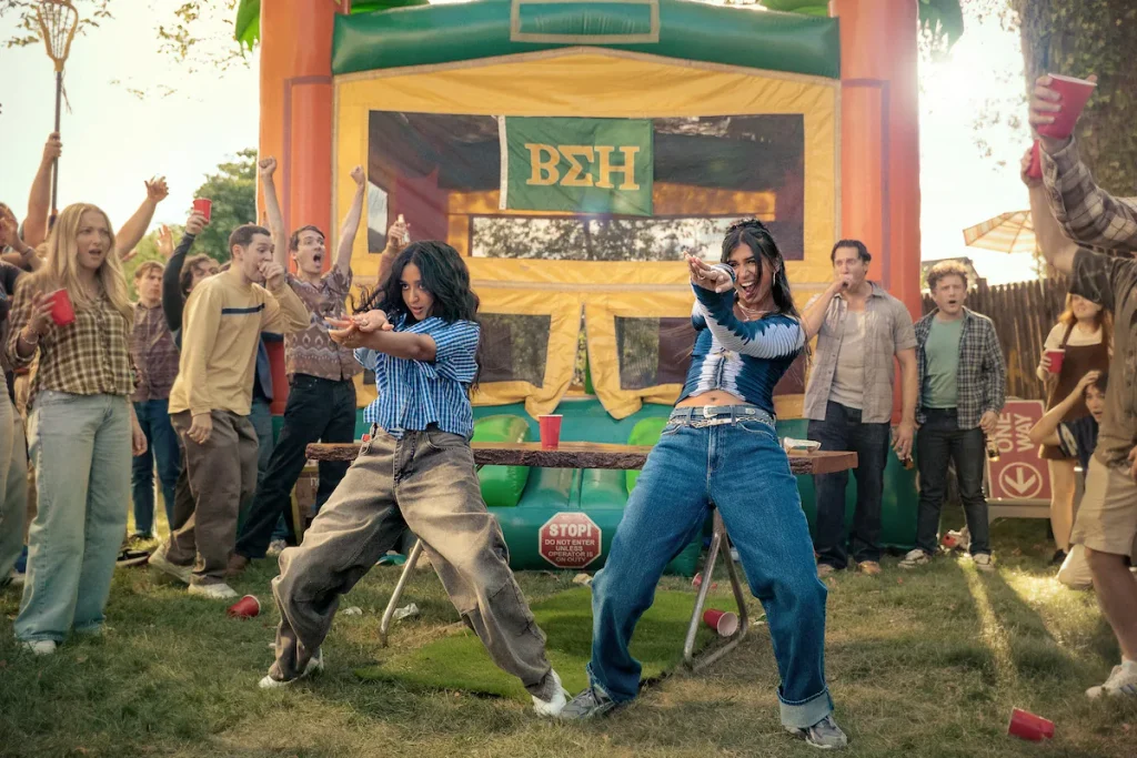 Two college dancers perform together at an outdoor party in Best of the Best