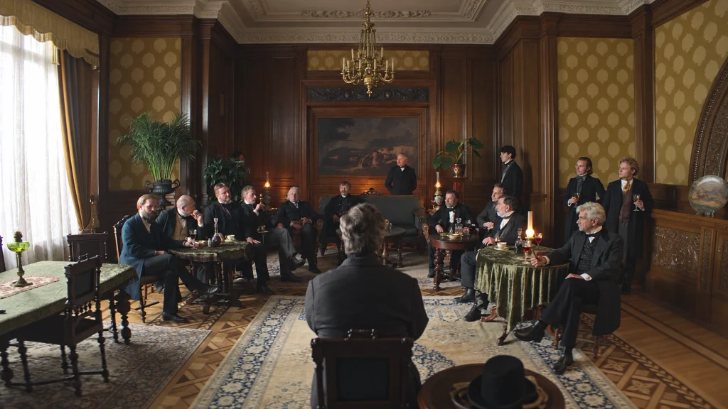 Men in formal nineteenth-century clothing gather in a wood-paneled room in The Doll