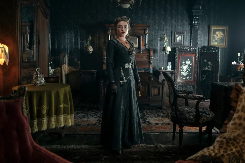 Cathy wears a black dress in an ornate parlor in East of Eden.