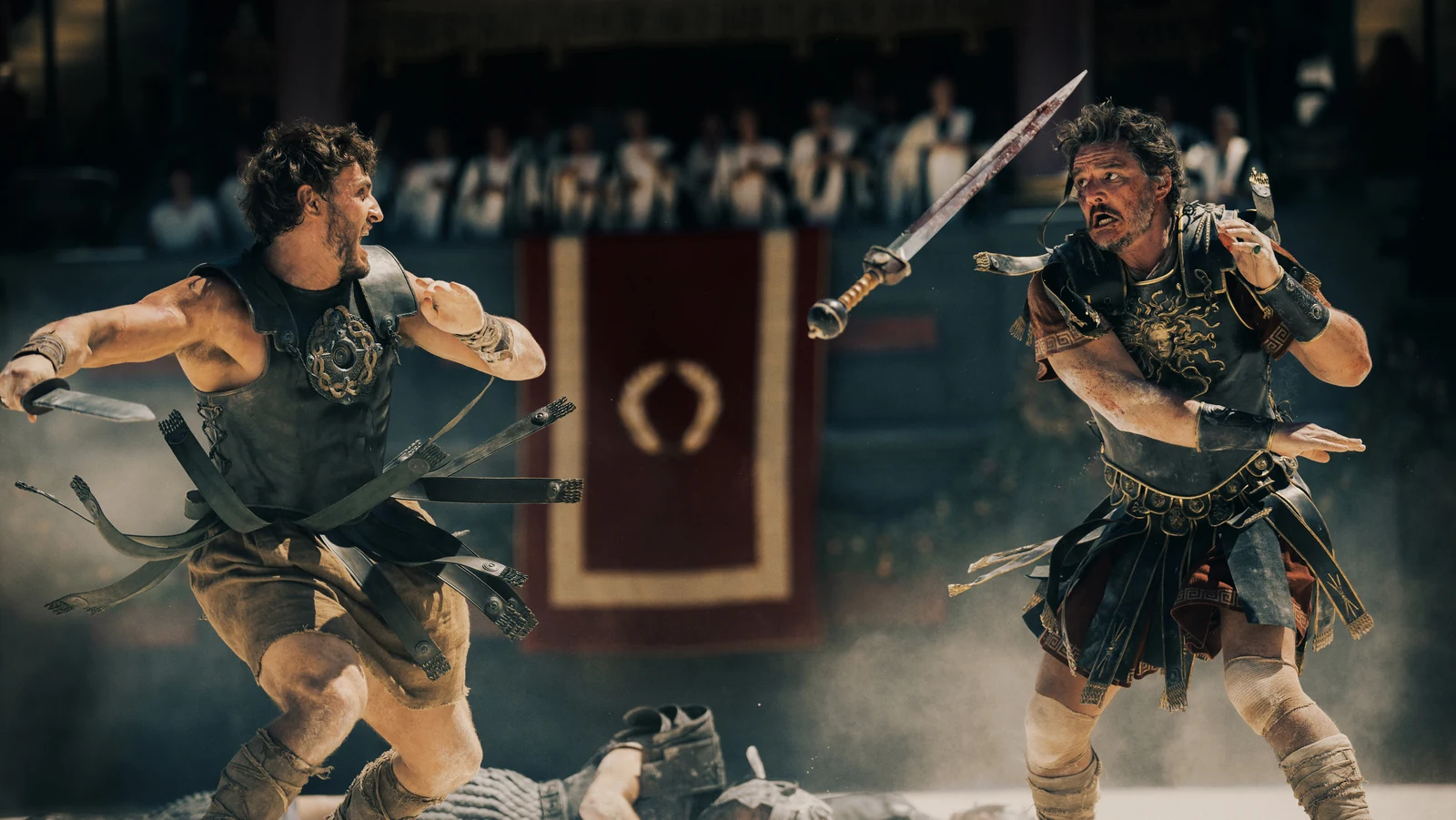 Lucius and General Acacius fight with swords in the arena in Gladiator II.