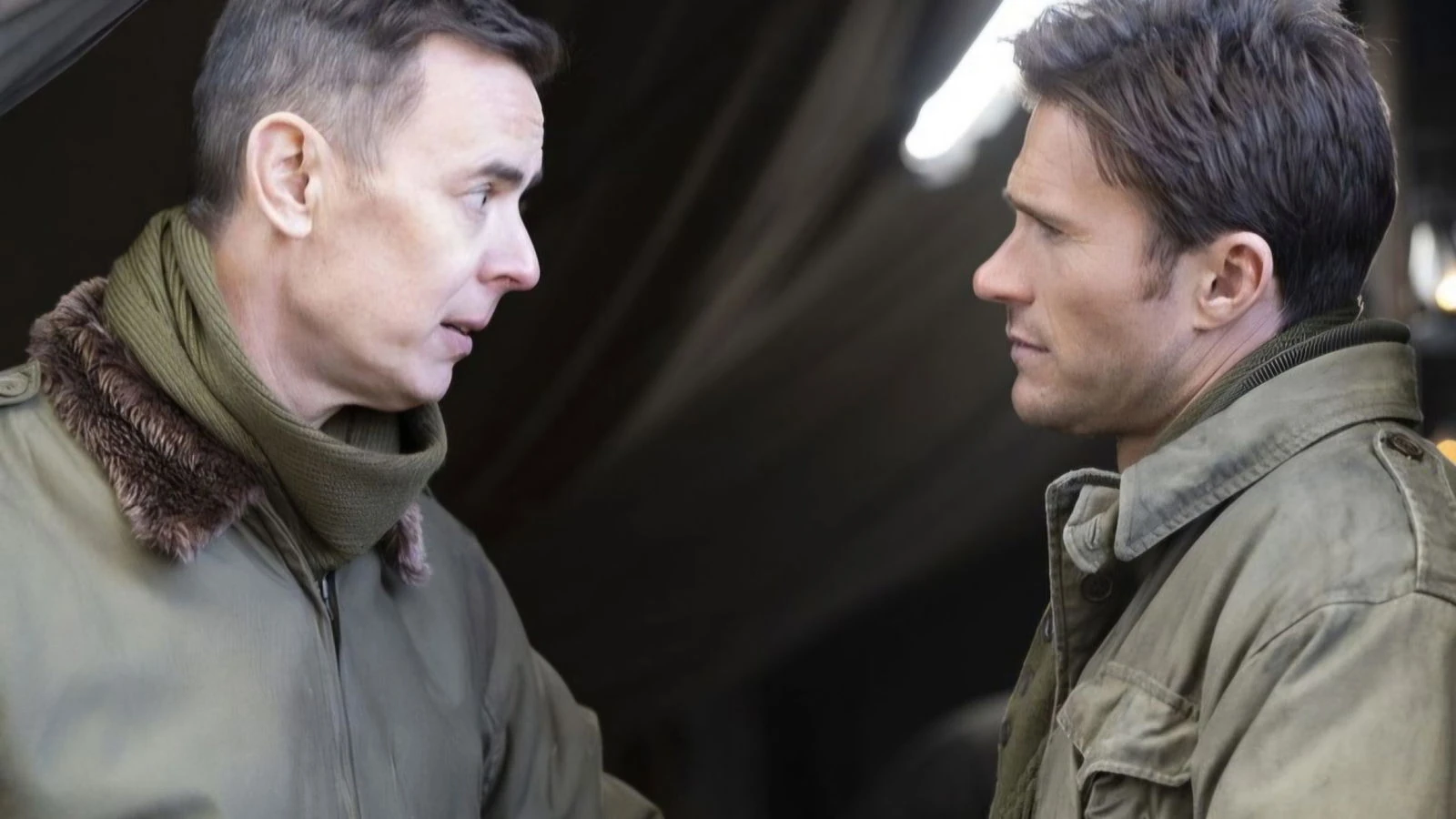 Colonel Neale (Colin Hanks), left, faces John Castle (Scott Eastwood) inside a tent in Lucky Strike.