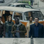 Matchbox: Sean’s Friends Have Their Own Reasons to Fight Ted, Aimee, Crosby, Charmaine, and Sean stand in front of an orange-and-white van in Matchbox The Movie.