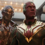 Ultron stands behind Vision beneath chandeliers in VisionQuest